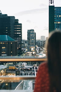 woman standing in front of window thumbnail
