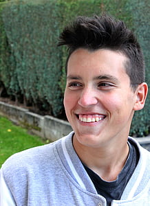 close-up photography of man wears gray and black top thumbnail