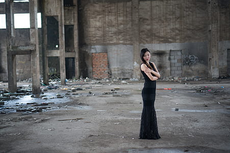 woman wearing black sleeveless dress thumbnail
