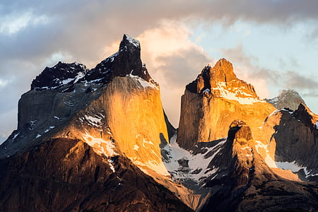 landscape photography of mountain alps during cloudy skies thumbnail