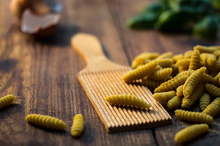 dried pasta on brown wooden board thumbnail