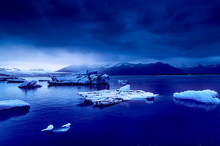 body of water and ice formations thumbnail
