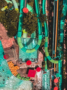 green pool slide aerial photography thumbnail
