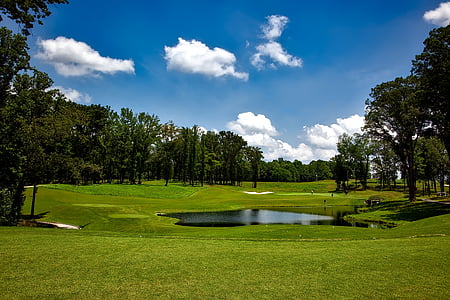 body of water under blue sky thumbnail