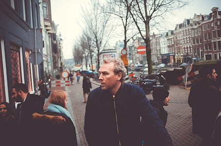 man wearing black zip-up jacket thumbnail