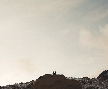two person on top rock thumbnail