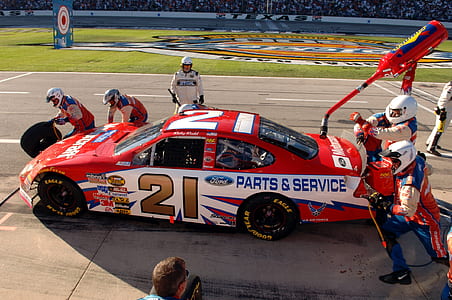 red and white race track and teams thumbnail