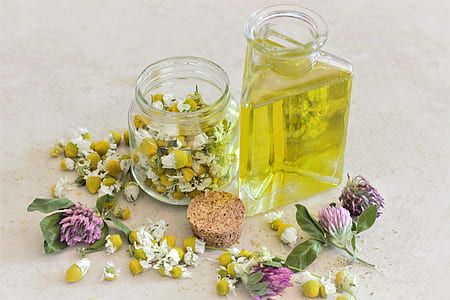 yellow flowers in clear mason jars thumbnail