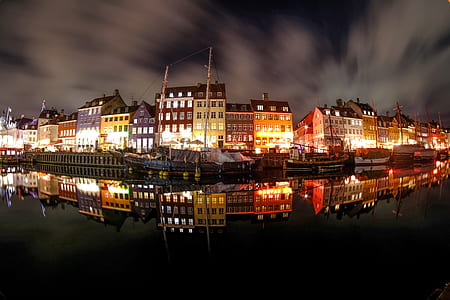 panorama photography of house infront of body of water thumbnail