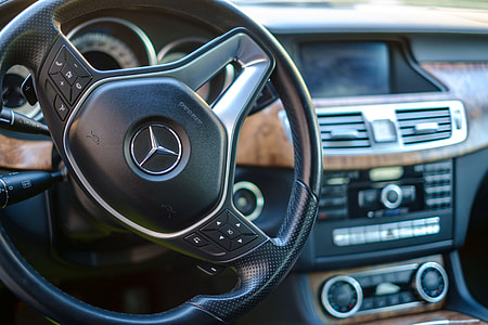 black and gray Mercedes-Benz vehicle steering wheel thumbnail