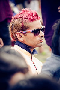 Man Wearing White Top and Black Wayfarer Sunglasses thumbnail