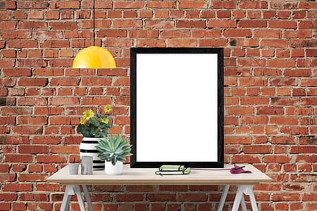 black wooden photo frame on white wooden table thumbnail