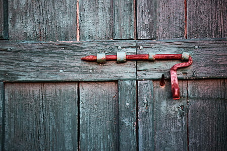 close-up photo of brown wooden doors thumbnail
