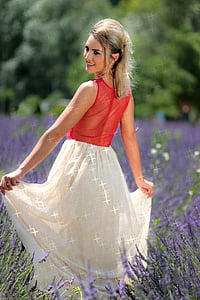 woman wearing red and white sleeveless dress thumbnail
