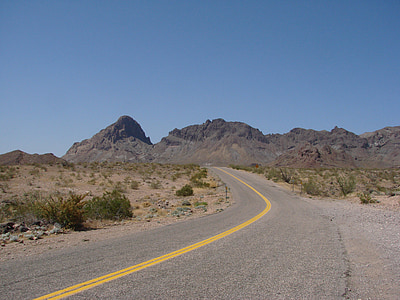 paved road at deserted land thumbnail