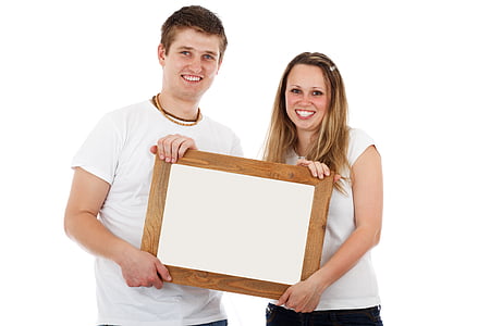 smiling woman and man holding wooden frame thumbnail