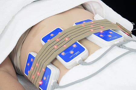 white medical equipment on tummy thumbnail