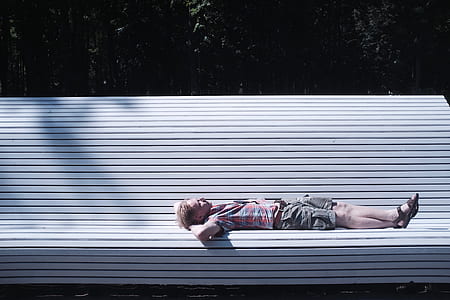 woman sleeping on white chair thumbnail