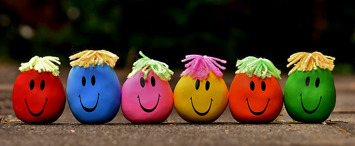 assorted-color smiley plush toys thumbnail
