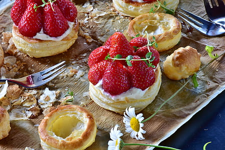 two strawberry shortcakes on table thumbnail