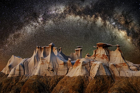 landscape photography of brown hills thumbnail