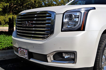white GMC Yukon SUV thumbnail