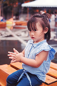 Baby Girl Wearing Blue and White Pinstripe Top and Pants Set thumbnail