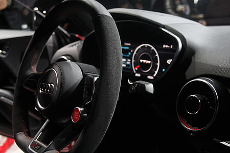 black Audi vehicle steering wheel thumbnail