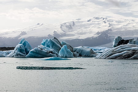 ice bergs near body of water thumbnail