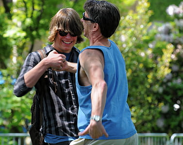 two men shaking each other's hand thumbnail