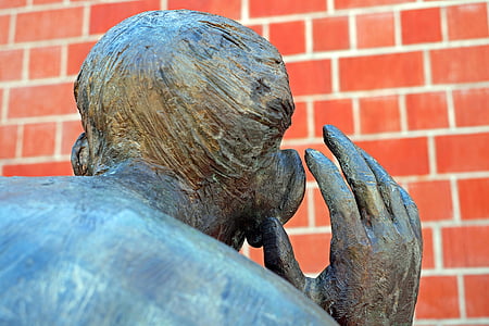 gray statue photo during daytime thumbnail