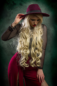 long blonde-haired woman wearing purple hat thumbnail