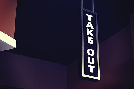 lighted white Take Out sign at nighttime thumbnail