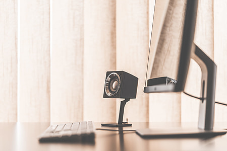 Speaker in Minimalistic Office Workspace Setup thumbnail