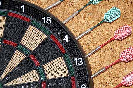 assorted-color darts on attached on board thumbnail