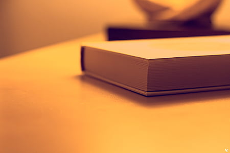 book on white surface thumbnail