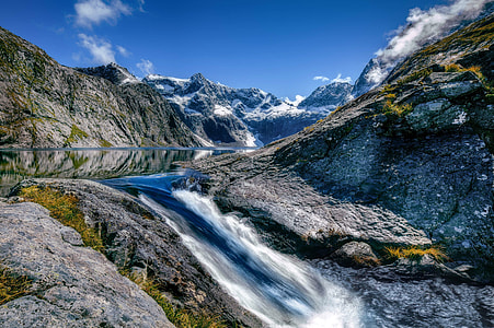 Mountains and River landscape in Fiordland National Park, New Zealand thumbnail