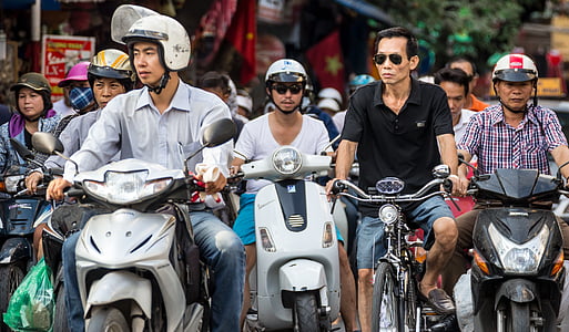 man wearing black polo shirt riding on bicycle thumbnail