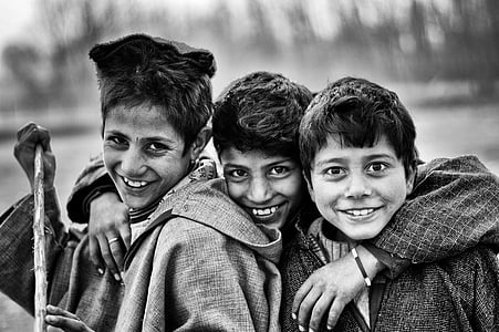grayscale photo of three boys smiling thumbnail