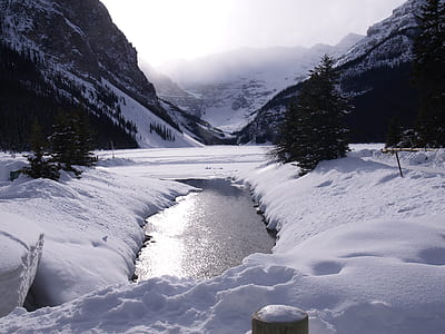 mountains with snow during daytime thumbnail