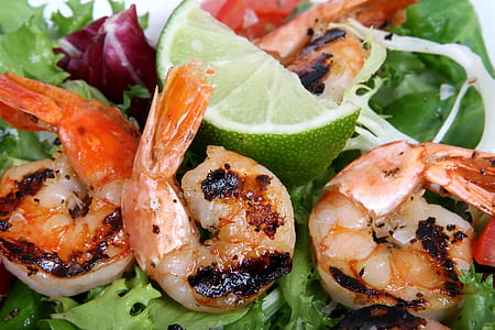 roasted shrimps and lime closeup photo thumbnail