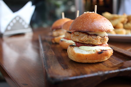 photo of burger on wooden plate thumbnail