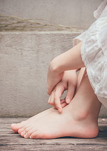 Close-Up Photography of Hands And Feet thumbnail