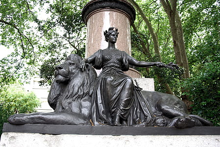 woman and lion statue thumbnail
