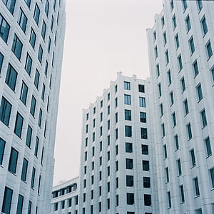 white concrete high-rise building thumbnail