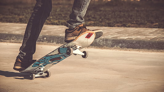 person riding on skateboard and doing tricks thumbnail