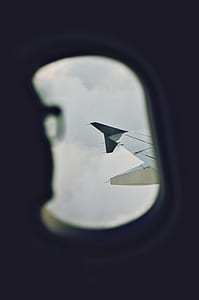 window view of airplane wing thumbnail