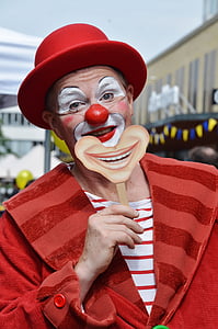 person wearing clown costume thumbnail