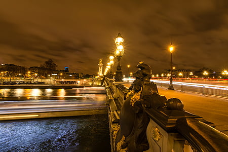 selective focus photography of bridge with lighted post lamp thumbnail