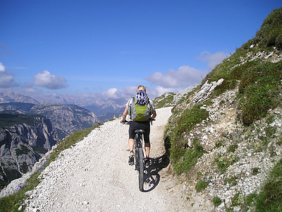 person riding bike on mountain thumbnail